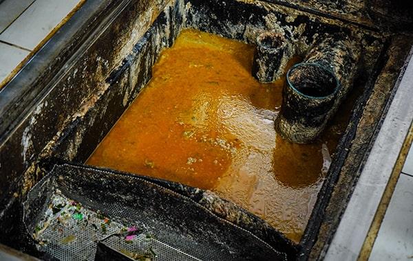 you should schedule grease trap cleaning for your restaurant a minimum of every 90 days to prevent buildup